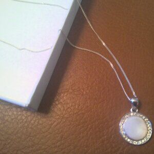 Sterling silver necklace with round white pendant